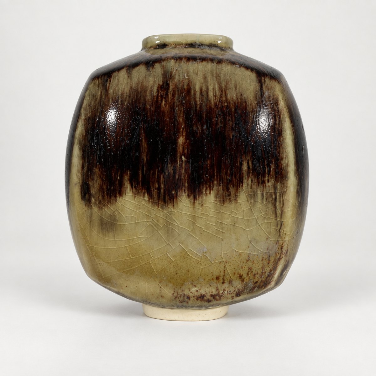Slipcast form, pale green crackle with a dark shoulder